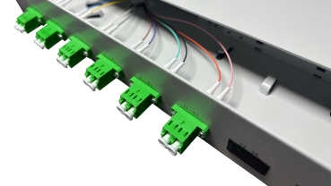 Preview: OV-06xLC-D SMA 19 Zoll Spleissbox 6xLC-D SM APC 1HE/12/gr CSH 12Pgt 9/125 6Kup grün